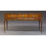 A Regency mahogany serving table, converted from a square piano, the top with chevron inlaid
