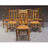 A set of eight oak Arts & Crafts dining chairs, in the manner of William Birch, early 20th