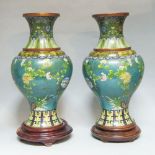 A pair of large Chinese cloisonné vases, 20th century, of baluster bellied form, with swags of
