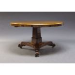 A Regency rosewood breakfast table, the circular top on tri-form column support to trefoil base,