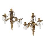 A pair of French gilt-bronze, rock-crystal and glass three-light wall appliques, late 19th