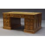 A mahogany pedestal desk, late 19th, early 20th Century, the top inset with green leather writing