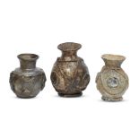 Three post-Roman squat globular form glass jars, Eastern Mediterranean, 6th-7th century, with disc