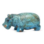 An Egyptian turquoise glazed composition hippopotamus, Second Intermediate Period, circa 1786-1590