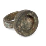 A Roman large bronze ring missing intaglio, 1st-2nd century A.D., 2.9cm. diam. Provenance: Private