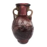 A Sidonian small mould-blown flask, second half of 1st century A.D., made in streaky purple glass