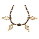 A composite ancient and modern glass, garnet and gold necklace with openwork vase elements, the