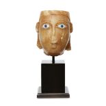 An alabaster head with inlaid eyes, South Arabia, 1st century B.C. - 1st century A.D., South Arabia,