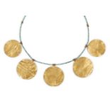 An ancient and modern sheet gold and turquoise necklace, comprised of five large flat gold discs