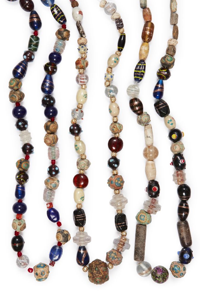 A group of three mixed ancient and modern bead necklaces comprised of Japanese porcelain beads,