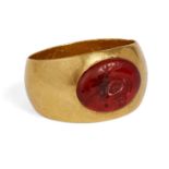 A gold ring with Roman carnelian intaglio of a cockerel, 2nd century B.C. - 1st century A.D., 19th-