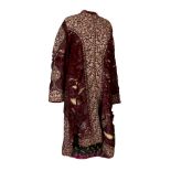 A purple velvet coat with gilt metal thread and sequined borders, India, early 19th century,