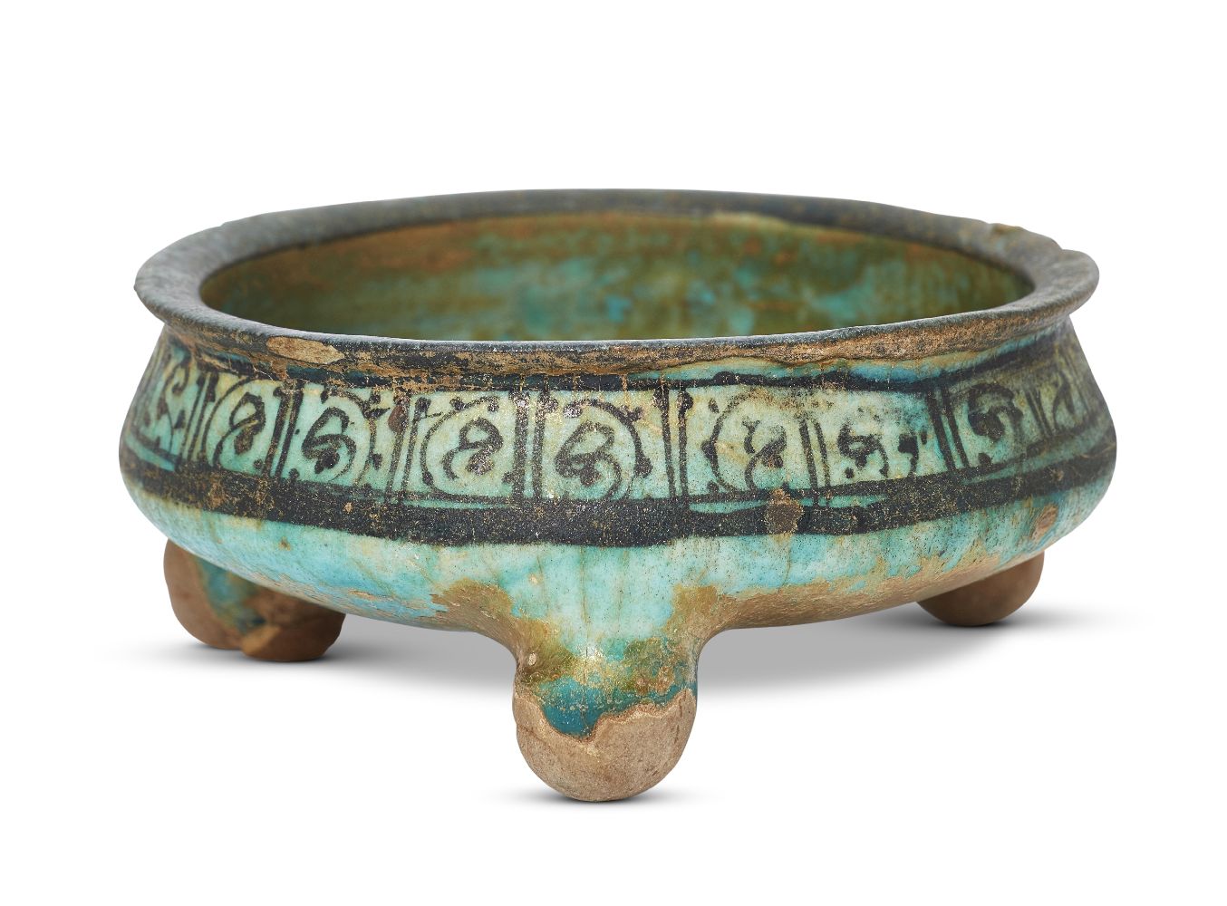 An Ayyubid Raqqa ware underglaze painted pottery bowl, Syria, first half of the 13th century, on