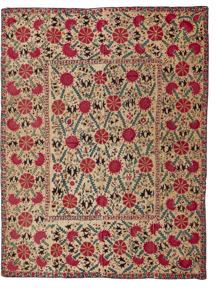 A Susani embroidered panel, Central Asia,19th century, of rectangular form, with central rectangular