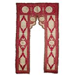 Two Ottoman matching embroidered silk portieres, Turkey, late 19th-early 20th century, of arched