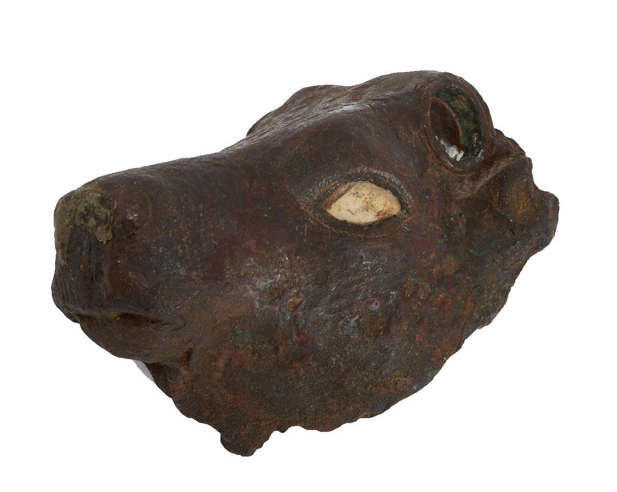 A Mesopotamian bronze bull head attachment, 3rd millenium B.C., with shell eye inlay remaining,