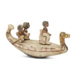 An Egyptian gesso-painted wood funerary model of a boat, Middle Kingdom, circa 2046-1794 B.C., the