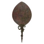 A Parthian or Eastern Roman bronze mirror, 1st century B.C. - 2nd century A.D., the ovoid disk