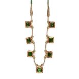 An early 20th century emerald set enamelled gold necklace, Jaipur, India, comprised of seven