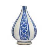 A Safavid blue and white bottle vase, Persia, 17th century, pyriform with bulbous base supported