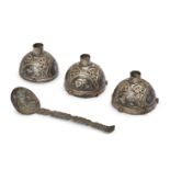 A group of nielloed silver domed fittings, Iran, 12th century and a silver spoon, 5.5cm. high, spoon