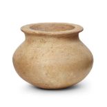A Bactrian alabaster pot, 3rd millennium B.C., of squat globular form rising to a flared rim, 6.