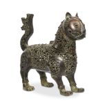 An openwork bronze censer in 12th century style, formed as a standing lion with raised tail,