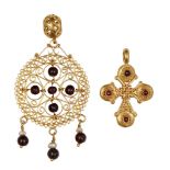 A Byzantine-style filigree pendant and gold cross pendant, both set with red stones, 4cm. high and