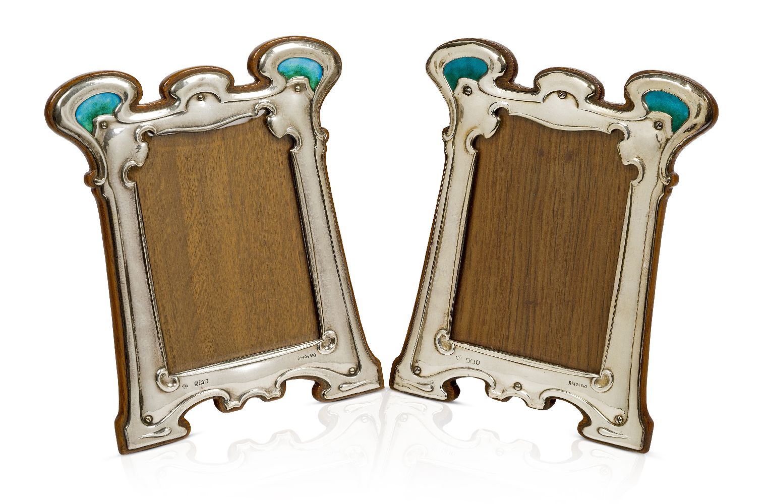 William Hutton & Sons, a pair of Arts and Crafts silver and enamel photograph frames Mark of William