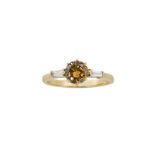 A coloured diamond single stone ring, the brilliant-cut brown diamond, weighing approximately 1.20