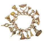 A 19th century gold bracelet suspending various fob seals, the curb-link bracelet with fifteen gold,