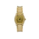 A lady's diamond wristwatch by A. Barthelay, the tonneau shaped dial with Roman numerals to a