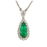An emerald and diamond cluster pendant, the pear shaped emerald within a brilliant-cut diamond