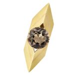 An 18ct gold and smoky quartz brooch, of sloped lozenge shaped design, the central circular-cut