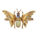A late 19th / early 20th century gold and gem butterfly bar brooch, the delicately engraved wings