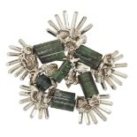 An 18ct white gold and green tourmaline brooch, by John Donald, of abstract design, the six columnar