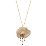 An agate and ruby pendant necklace, of abstract naturalistic design, the nodule of agate
