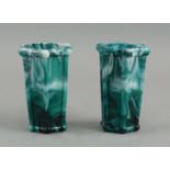 A pair of Victorian green and white opaline glass vases, of hexagonal form, with ribbed edges,