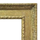 An English Gilded Composition Watts Frame, mid/late 19th century, with cavetto sight, centre tied