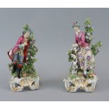 A pair of porcelain figures of a lady and gentleman, probably Samson, in the manner of the Chelsea