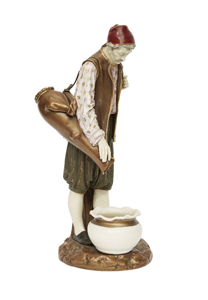 A Royal Worcester porcelain figure of a Turkish water carrier after a model by James Hadley,