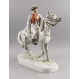 A Herend porcelain figure group of a horse and rider modelled by Bela Markup, stamped Markup B. to