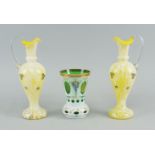 A green and white overlay glass vase, in the Victorian taste, decorate with flowers and gilt