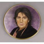 20th century School, a circular porcelain plaque of a portrait of a man, attributed to be Al Pacino,