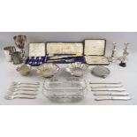 A large quantity of silver plate, including a pair of candlesticks with baluster stems, 16.5cm high,
