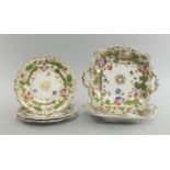 A pair of English porcelain square form plates, mid 19th century, with twin handles, decorated
