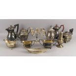 A collection of silver plated items, including a four-branch candelabra candlestick, a selection