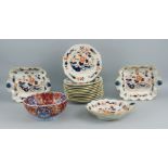 An English ironstone pottery part dinner/dessert service, 19th century, decorated in the Imari