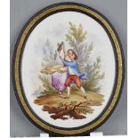 A French Sevres style oval porcelain plaque, 19th century, depicting two courting lovers in a wooden