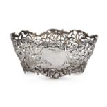 An oval silver basket, Sheffield c.1923, James Deakin & Sons, the body of pierced foliate form, with